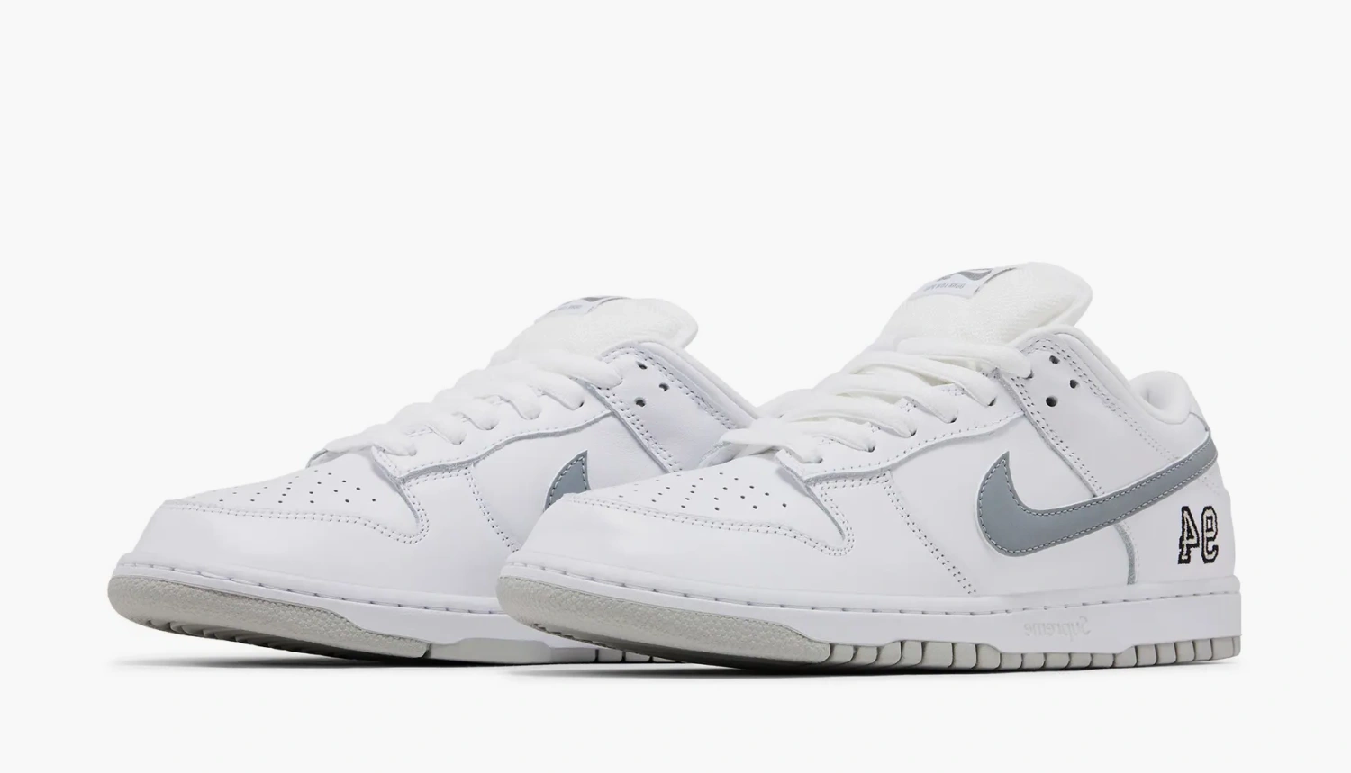 Nike Dunk Low SB x Supreme White Metallic Silver 