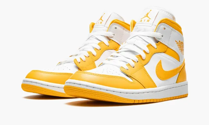 Кроссовки Air Jordan 1 Mid WMNS «University Gold» желтый