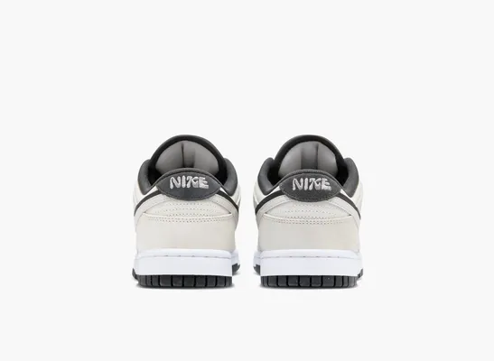 Кроссовки Nike Dunk Low SE WMNS «Double Swoosh - Photon Dust» serye