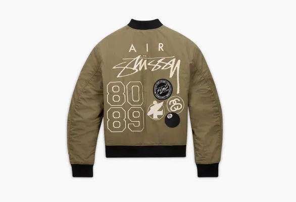  Stussy x Nike Reversible Varsity Jacket «Medium Olive/Bright Mandarin» zelyenye